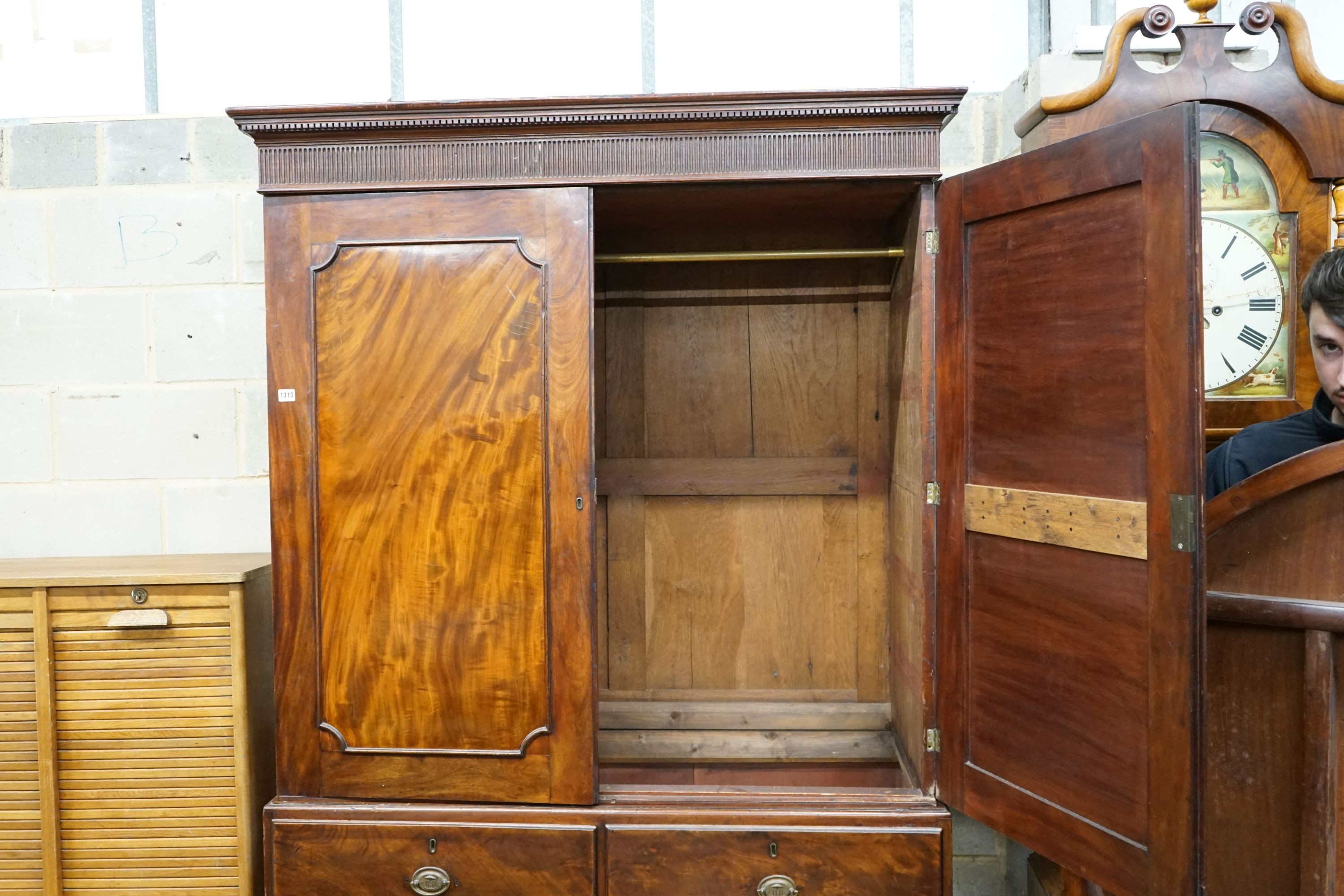 A George III mahogany linen press, width 130cm, depth 58cm, height 208cm